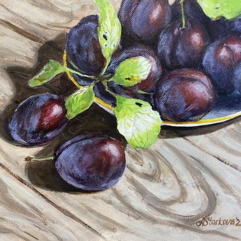 "Plums on sunny table"